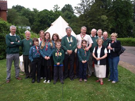 The Lions and the Scouts in front of one of the tents