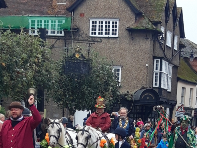 The town crier leads a colourful procession