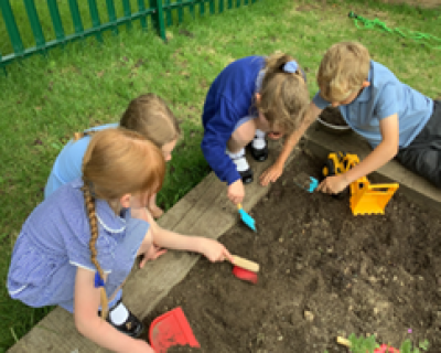 girls in the mud kitchen