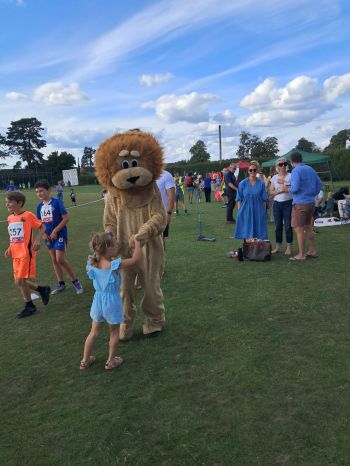 a dancing lion with young teacher a dancing lion with young teacher